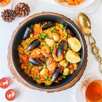  Paella? Een Zonnig Spant van Zeevruchten en Rijst die je Smaakpapillen Zal Verleiden!